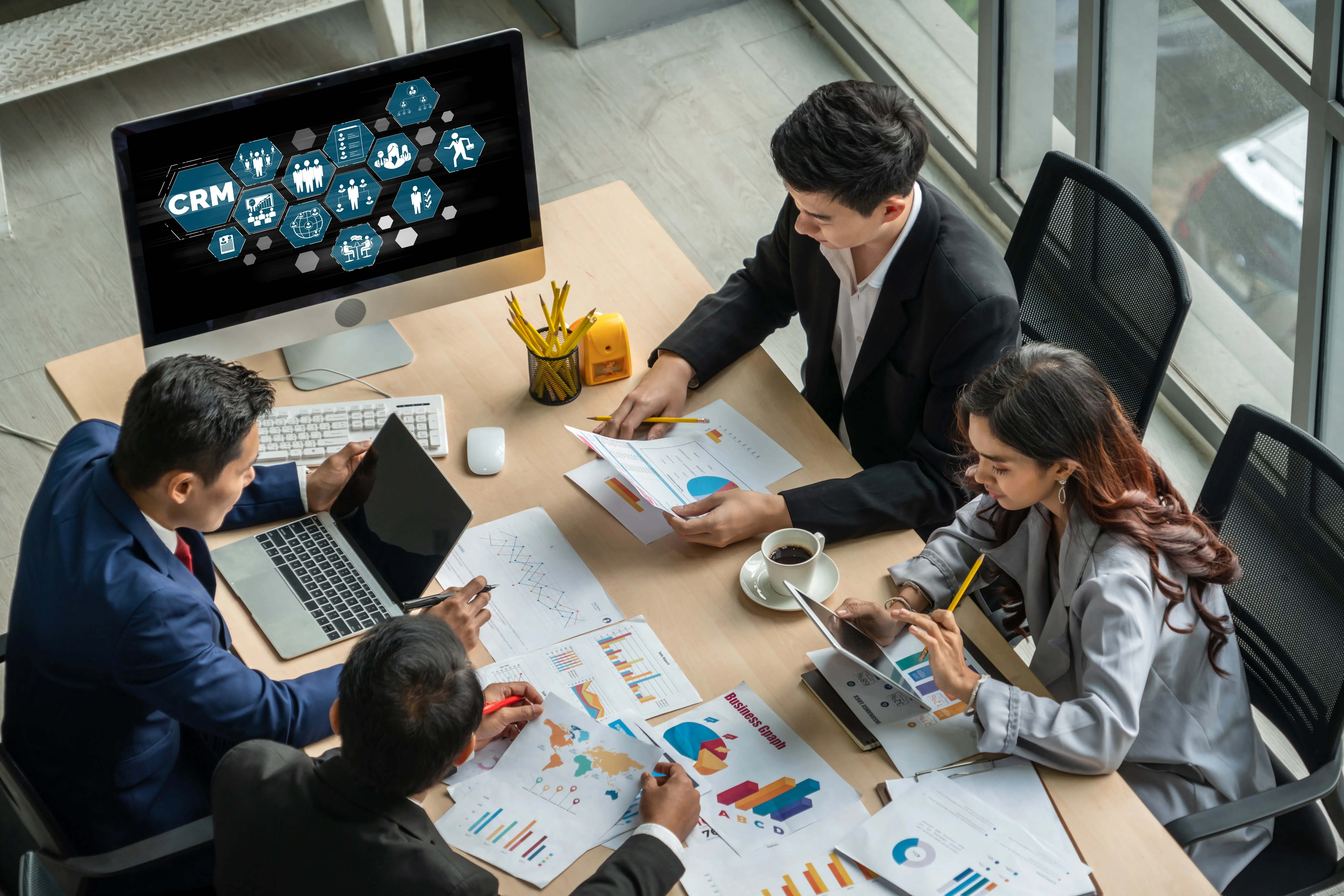 Business discussing CRMs